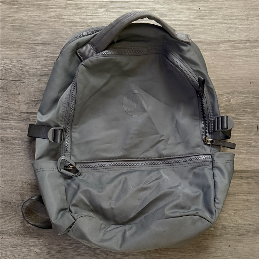 lululemon new crew backpack 
22 L
color asphalt grey